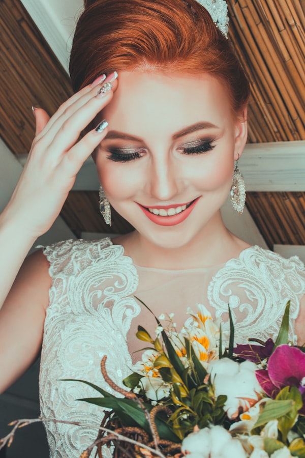 A polished red updo set for an occasion.