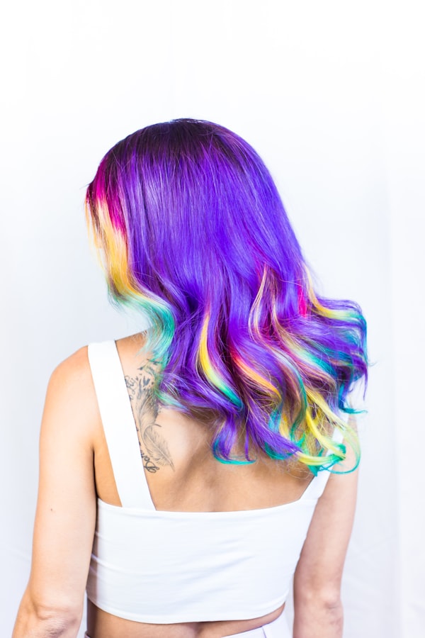 A vivid multi-color dye job in soft waves, seen from behind.